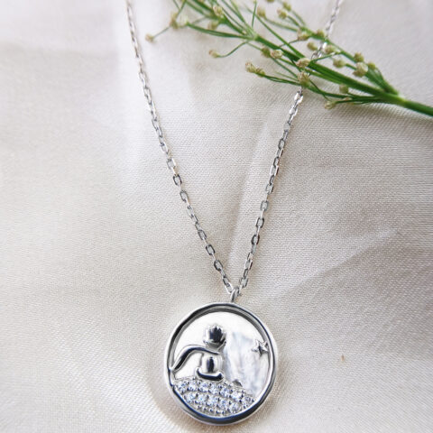 the Zodesi Silver Star Round Necklace adds a touch of celestial charm to any outfit.
