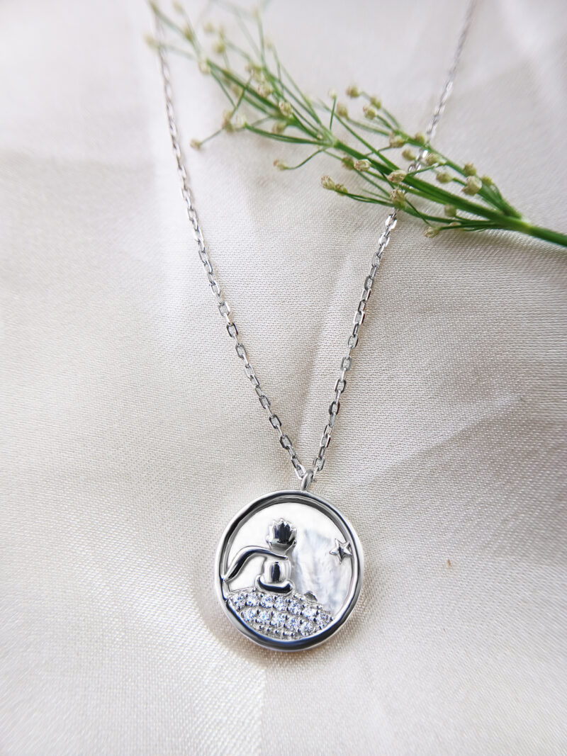 the Zodesi Silver Star Round Necklace adds a touch of celestial charm to any outfit.
